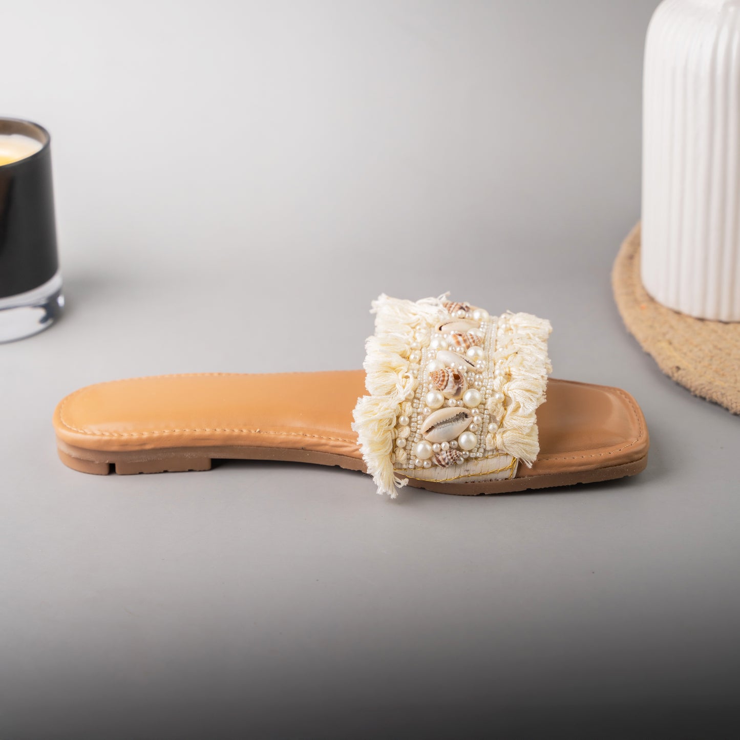 Stylish white beach sliders with bohemian flair