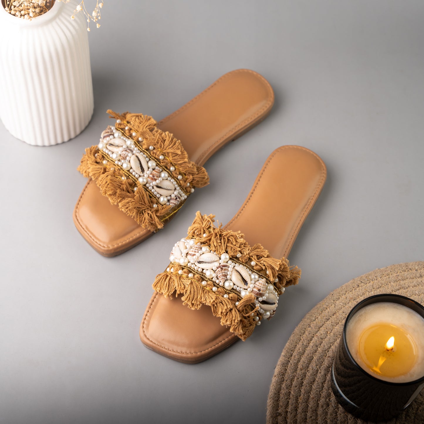 Comfortable sliders with ethnic-inspired beaded design, perfect for a boho fashion statement
