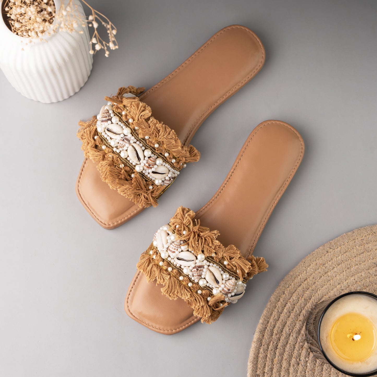 Elegant sliders featuring handcrafted bohemian-style beaded straps