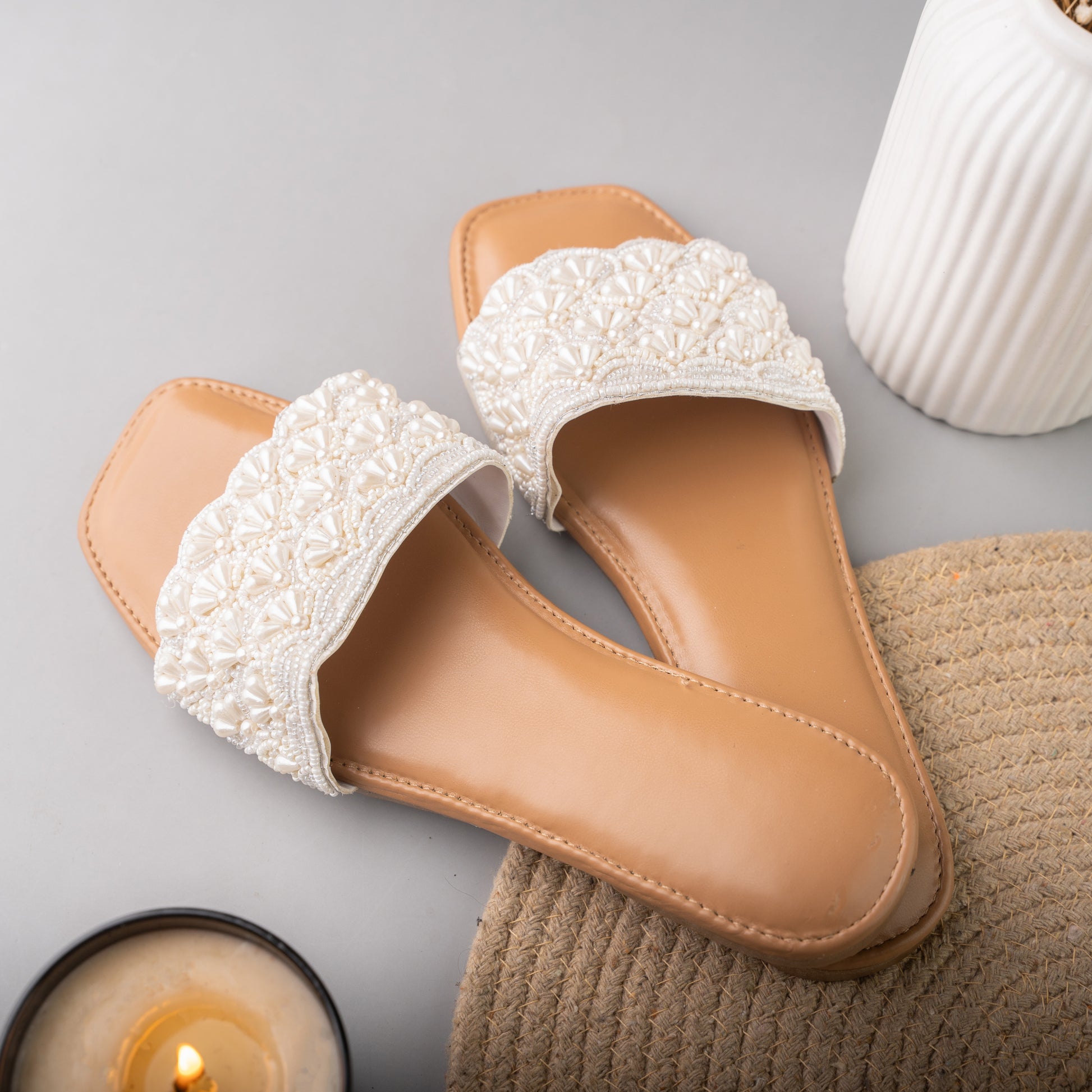 Stylish handcrafted beige flats featuring delicate white crochet strap design